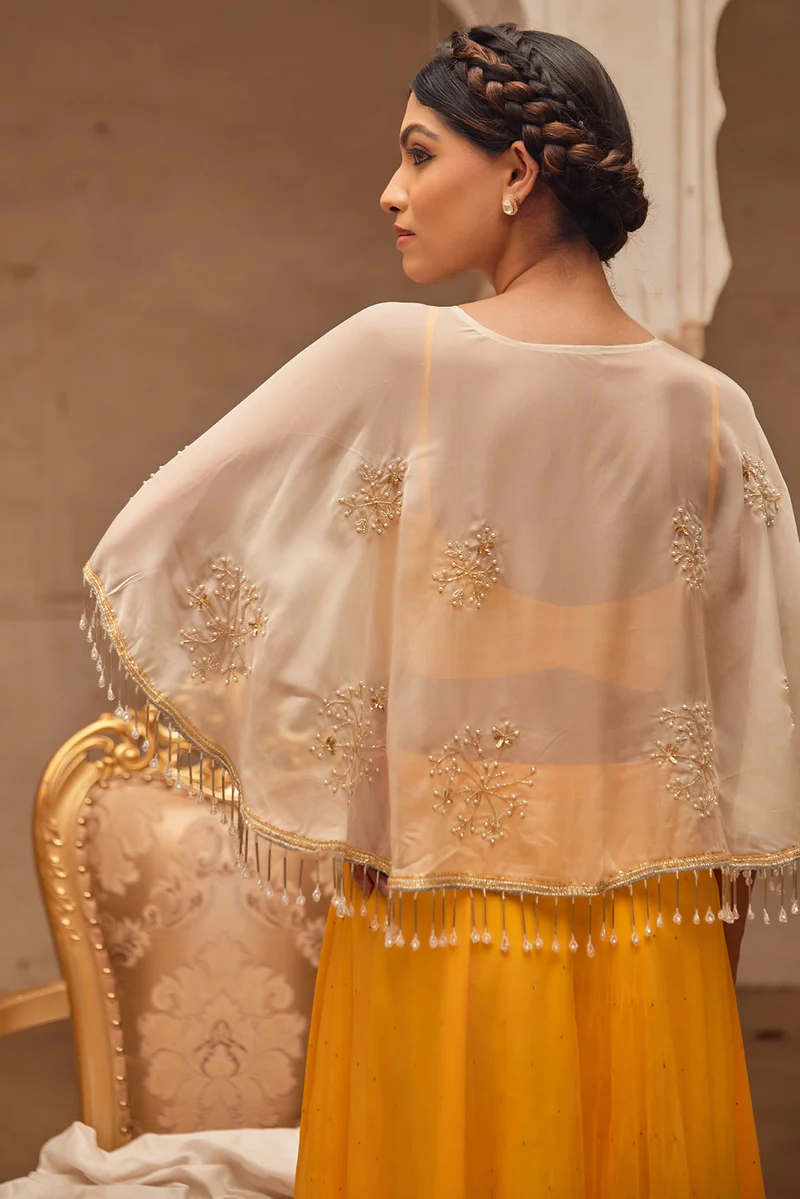 Yellow Chiffon Mukaish Lehenga With White Hand Embroidered Cape