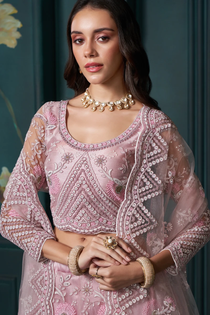 Pink Net Bridal Lehenga Choli with Heavy Embroidery