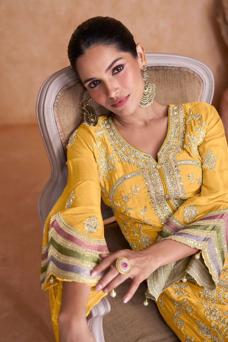 Pakistani Style Full Embroidered Salwar Suit in Yellow Chinnon