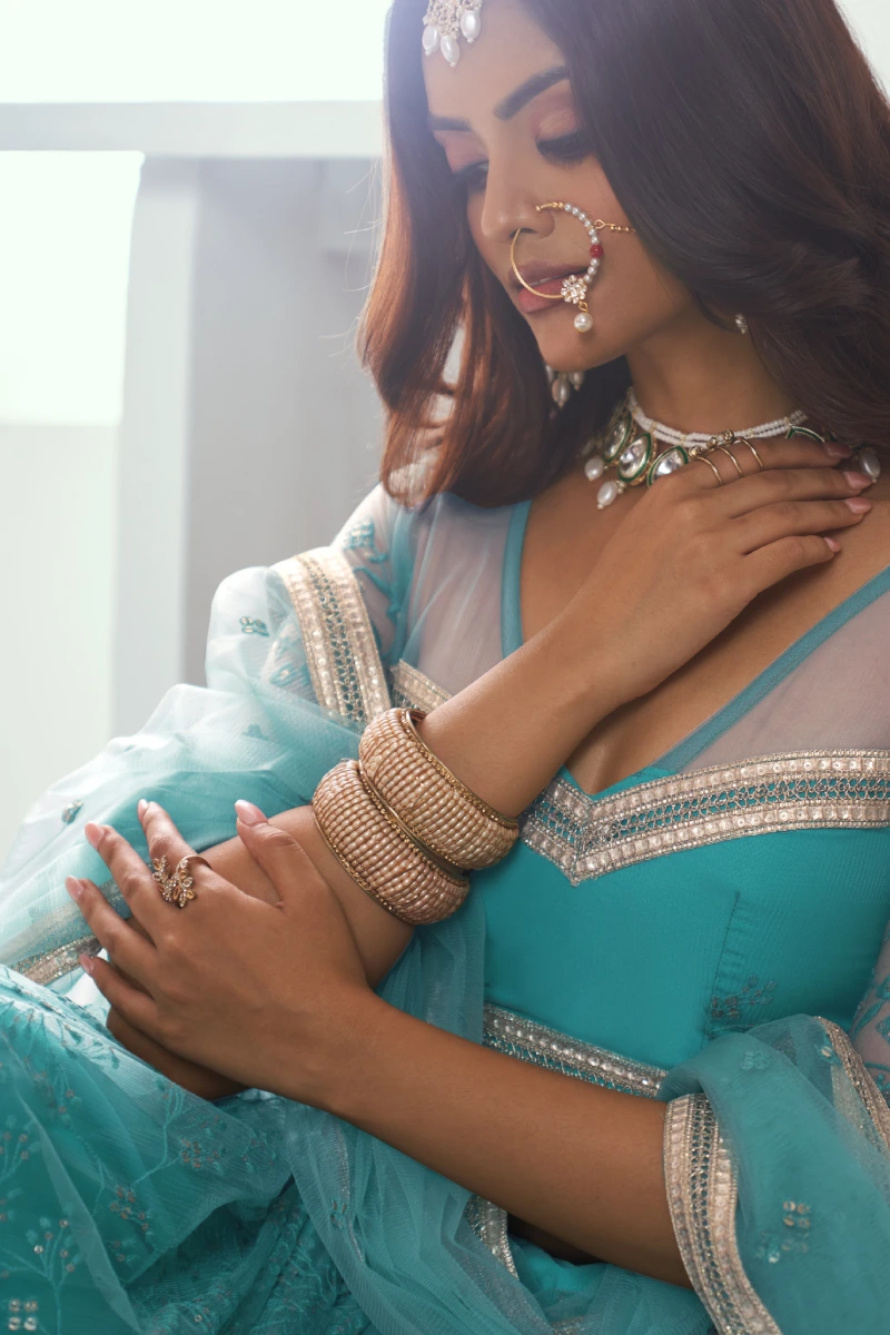 Turquoise Butterfly Net Lehenga Choli with Embroidered Thread Work